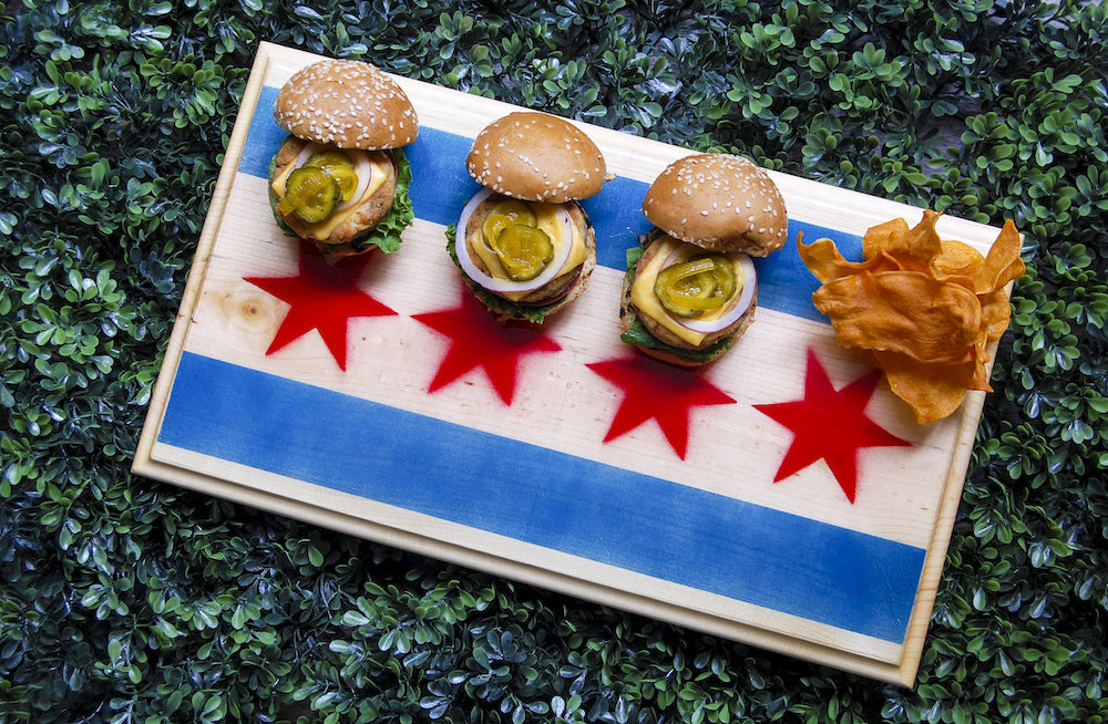 Sliders and Chips on a Chicago-themed cutting board.