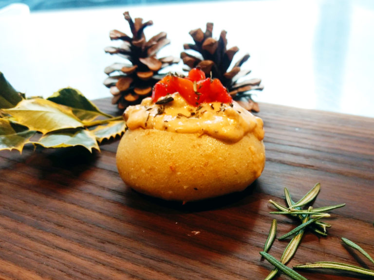 An Hors d'oeuvres with festive decorations around it.